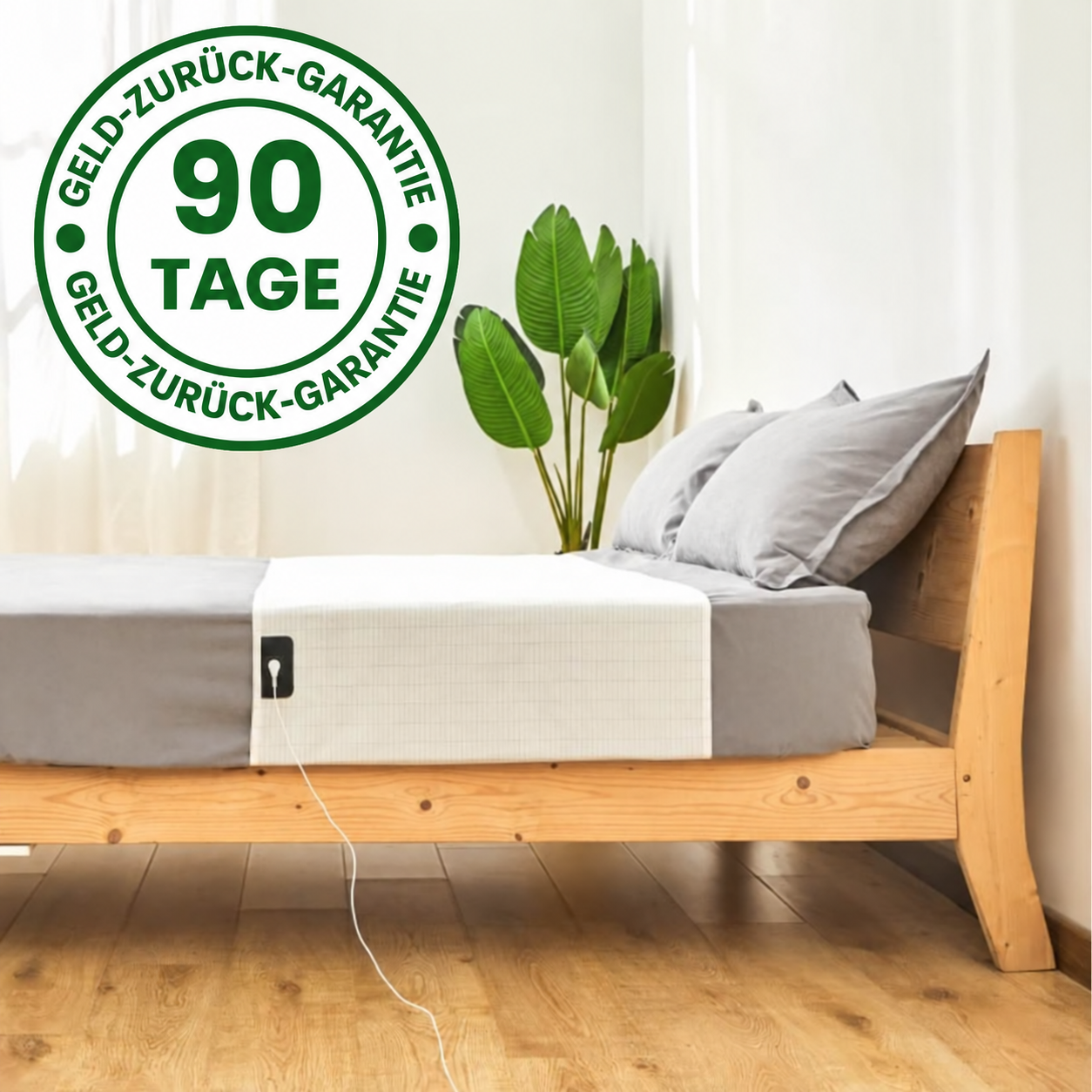 Erdungstuch auf dem Bett mit angeschlossenem Kabel